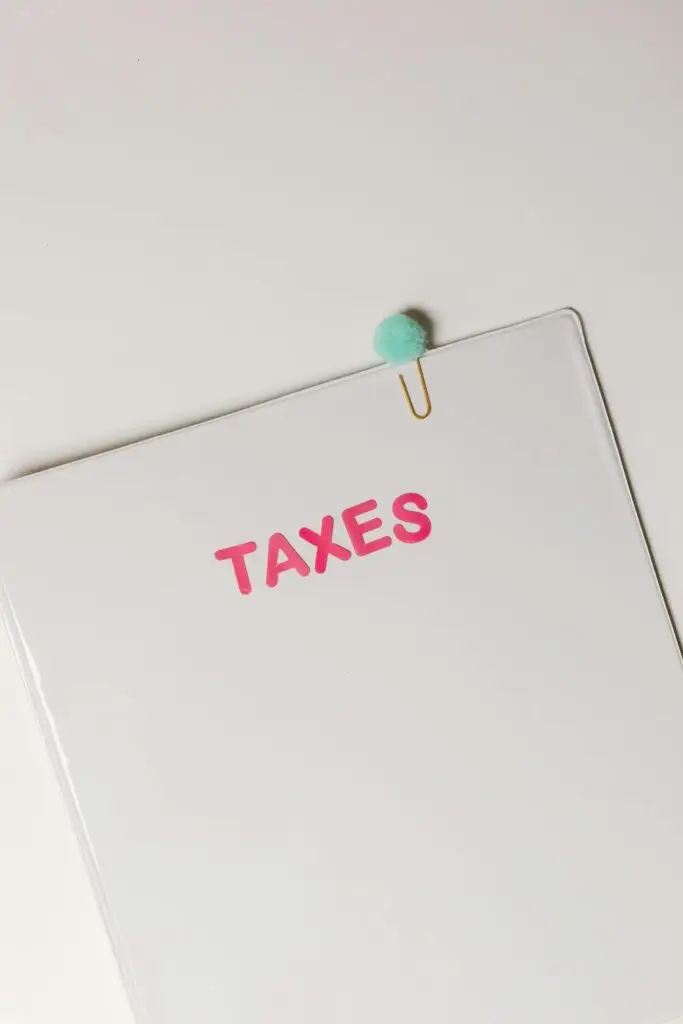 Paper with taxes written on it